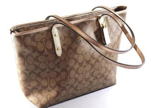 Load image into Gallery viewer, COACH signature coated canvas handbag in light brown with gold trimming - mystic-beauty-international-make-up-store